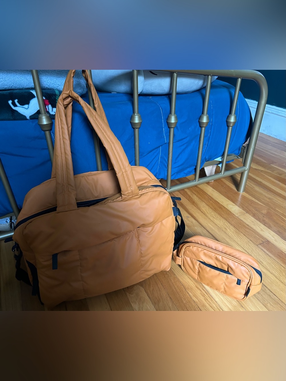 Calpak Luka Duffel and Toiletry Bag in Pumpkin
